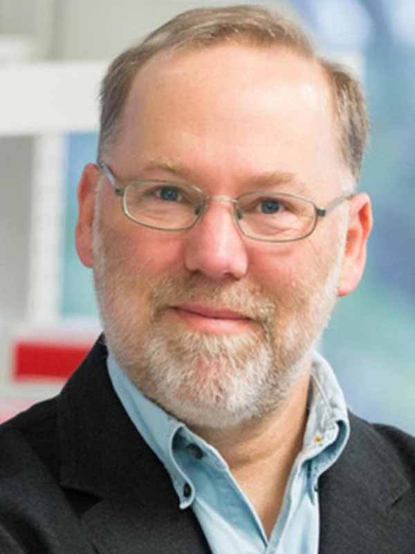 Head shot of Nobel Laureate Fred Ramsdell.